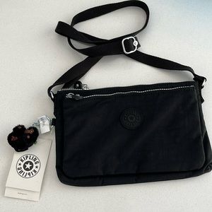 NWT Black Kipling crossbody bag. Adjustable strap length.